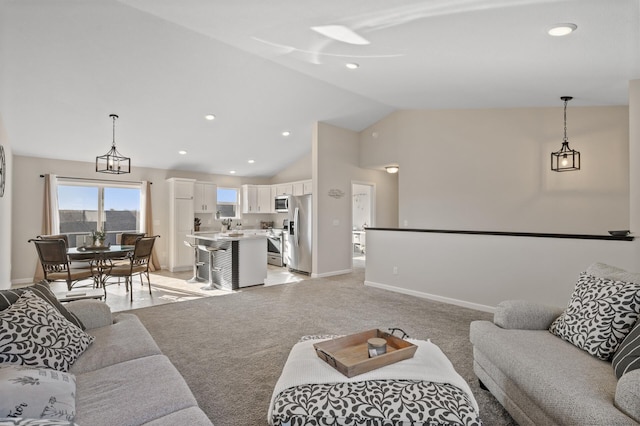 living area featuring recessed lighting, baseboards, vaulted ceiling, and light colored carpet