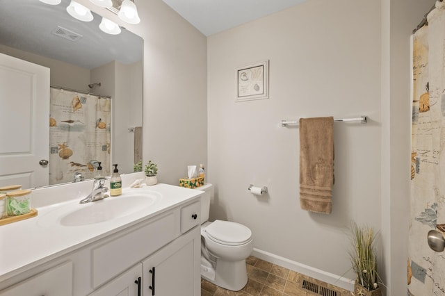 full bathroom with toilet, vanity, visible vents, and baseboards