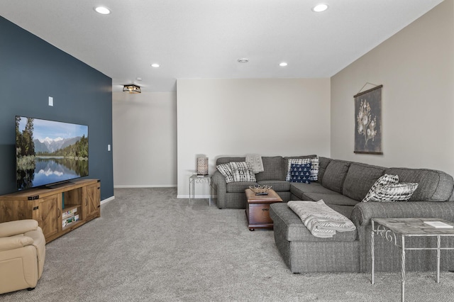 living area featuring carpet floors, baseboards, and recessed lighting