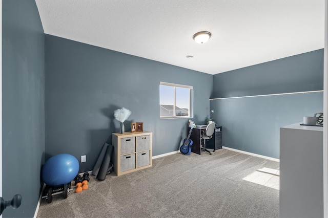 misc room with carpet and baseboards