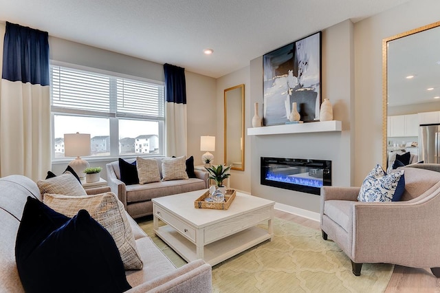 living room with light hardwood / wood-style flooring