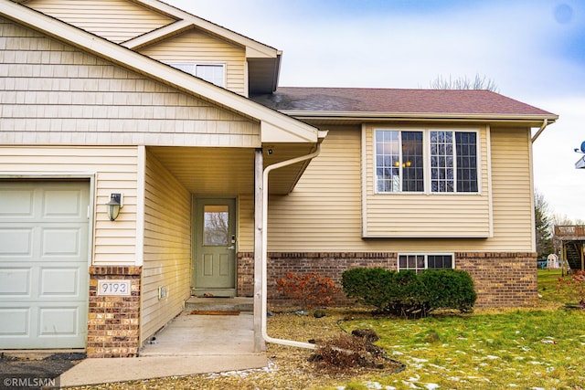 property entrance featuring a garage