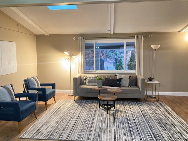 living room with wood-type flooring and vaulted ceiling