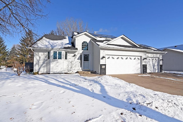 view of front of property featuring a garage