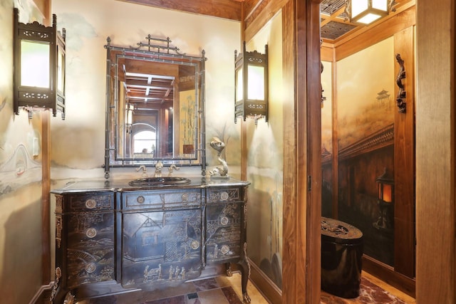 bathroom with vanity, toilet, and coffered ceiling