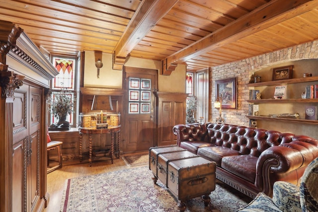 living room with wooden ceiling, beamed ceiling, and light hardwood / wood-style floors