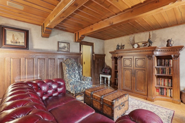 living room featuring beam ceiling