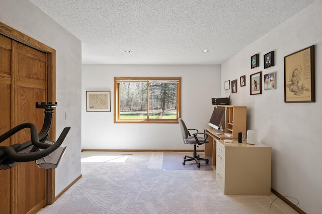 office area featuring baseboards, light carpet, recessed lighting, and a textured ceiling