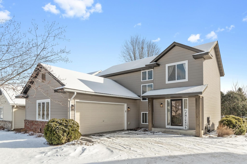 view of front of home with a garage