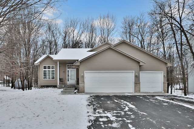 single story home featuring a garage