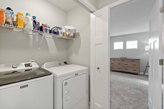 washroom with light carpet and separate washer and dryer