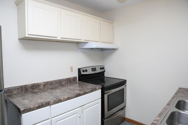 kitchen featuring white cabinetry, stainless steel electric range oven, and sink