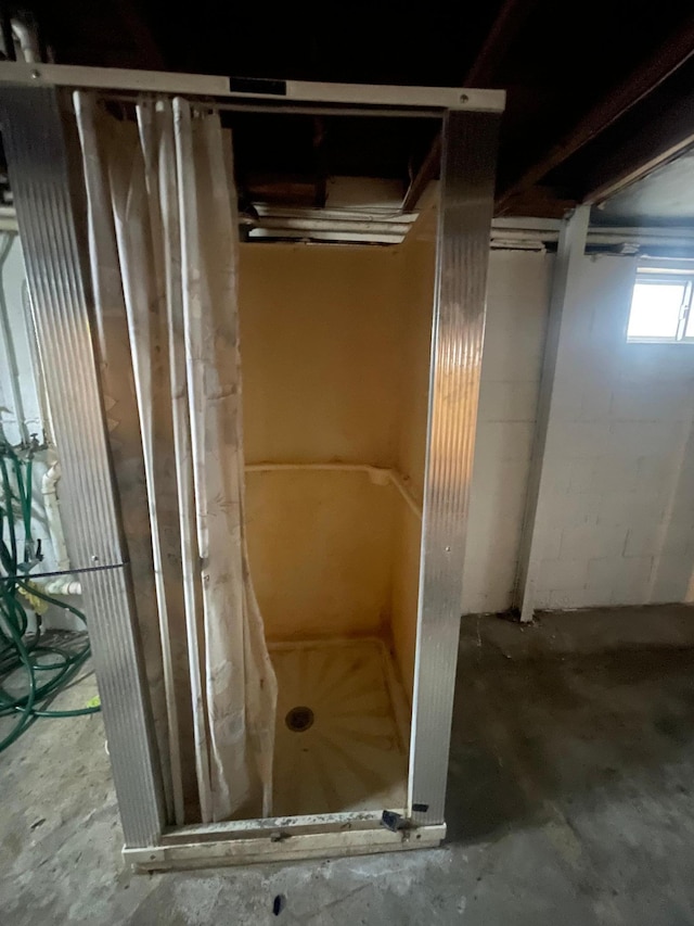 bathroom with concrete floors