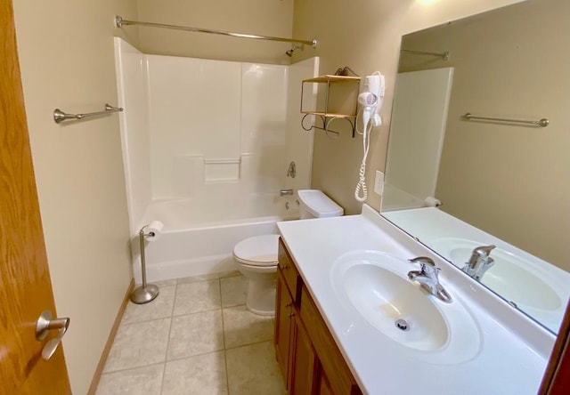 full bathroom featuring tub / shower combination, tile patterned floors, vanity, and toilet