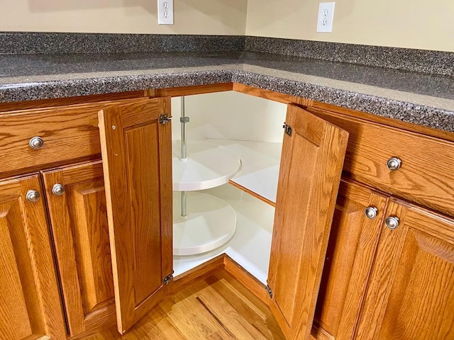 bathroom with hardwood / wood-style flooring