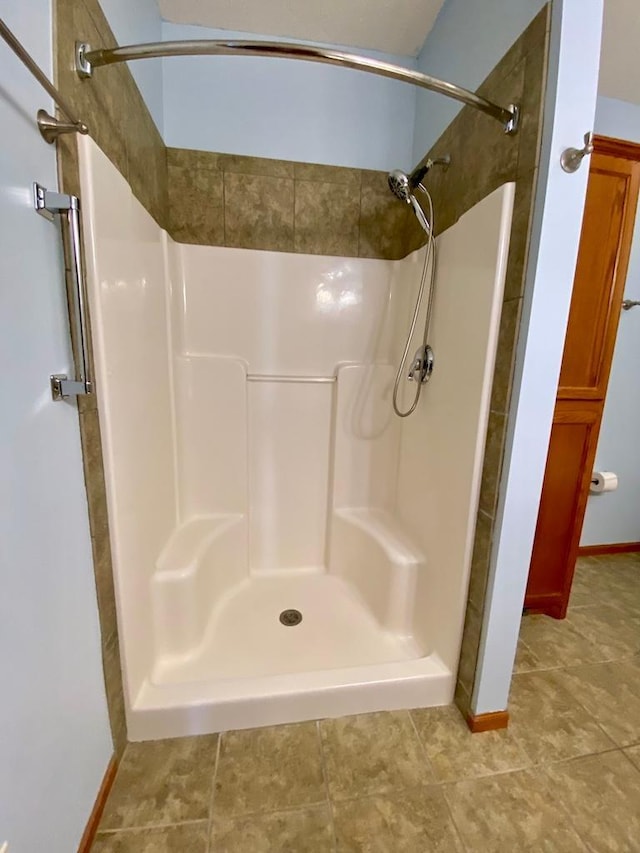 bathroom featuring a shower