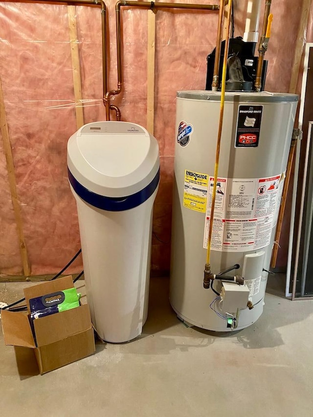 utility room featuring gas water heater