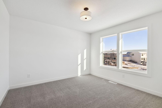 empty room with carpet floors