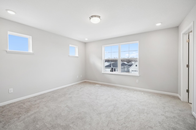 empty room with carpet flooring