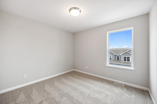 empty room with carpet floors