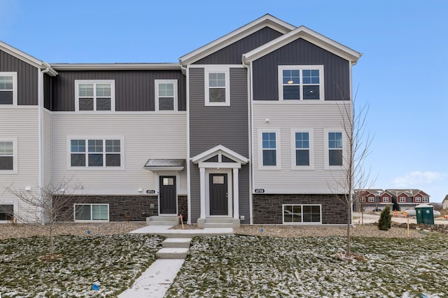 view of front of home featuring board and batten siding and entry steps