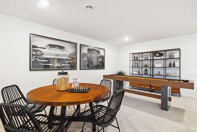 dining area featuring carpet flooring, recessed lighting, and baseboards