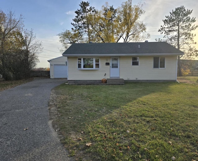 ranch-style house with a front yard