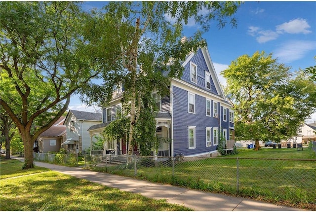 view of front of home with a front lawn