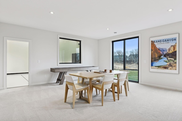 view of carpeted dining space