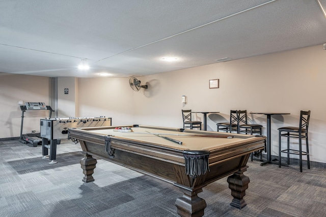 rec room featuring a textured ceiling, carpet floors, and pool table