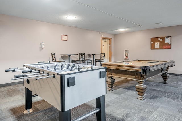 recreation room with carpet floors, a textured ceiling, and billiards