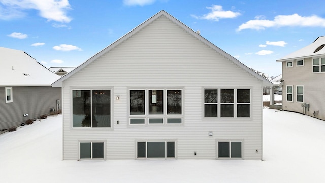 view of snow covered house