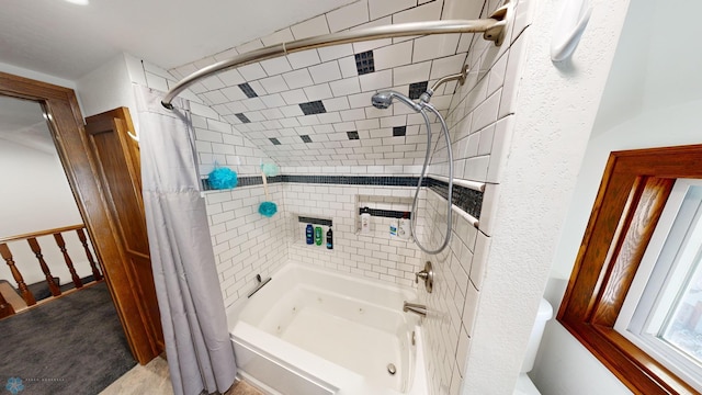 bathroom featuring shower / tub combo with curtain