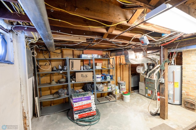 basement featuring heating unit and gas water heater