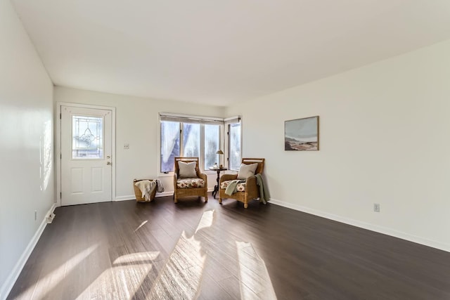 living area featuring dark hardwood / wood-style floors