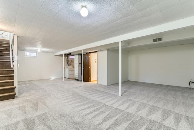 basement with washer / dryer