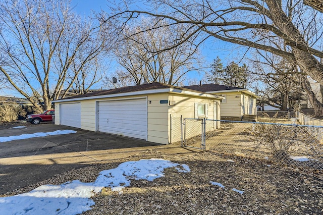 view of snow covered garage