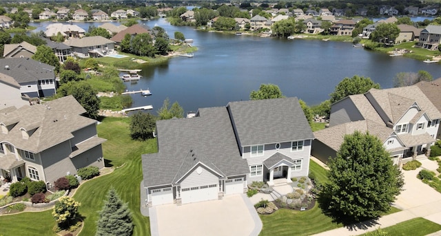 drone / aerial view with a water view