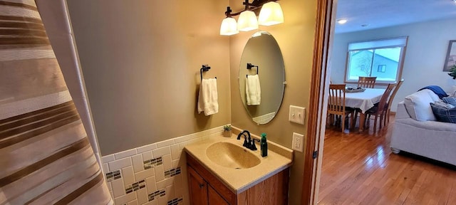 bathroom featuring hardwood / wood-style floors and vanity