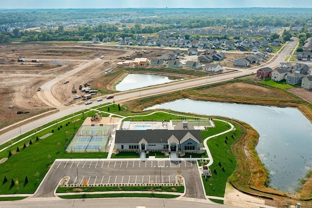 aerial view featuring a water view and a residential view