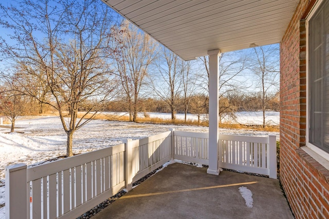 view of snow covered patio