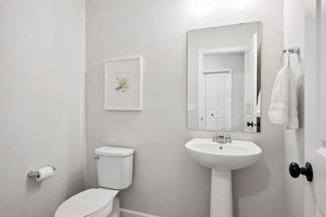 bathroom featuring toilet