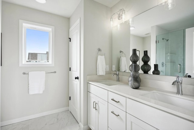 bathroom with vanity and walk in shower