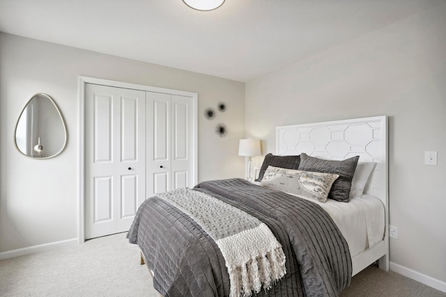 carpeted bedroom featuring a closet