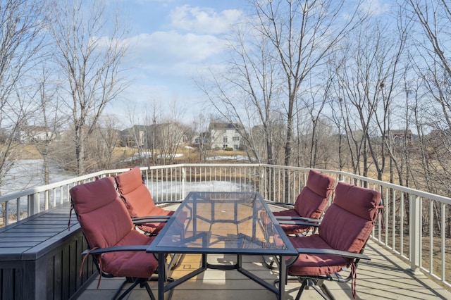 deck featuring outdoor dining area