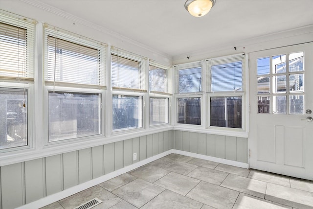 view of unfurnished sunroom