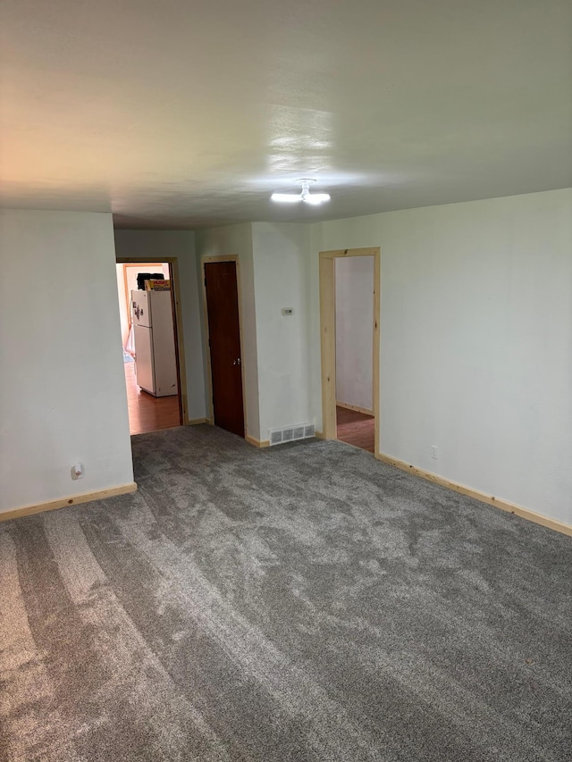 spare room with carpet flooring