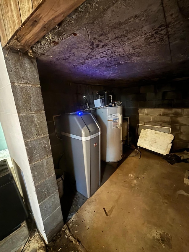 utility room with electric water heater