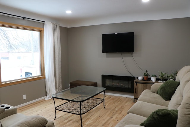 living room with light hardwood / wood-style floors