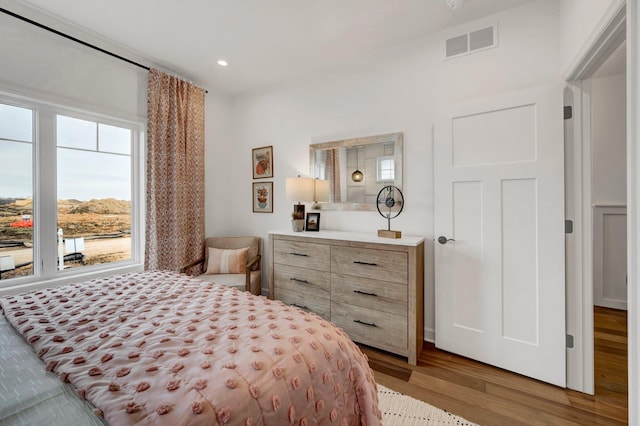 bedroom featuring hardwood / wood-style flooring